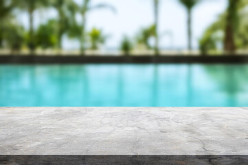Table or surface with tropical swimming pool or beach in the background