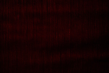 Surface of burgundy fabric denim grunge texture dark-red tone. Banner, background design images. Blank copy space text close-up
