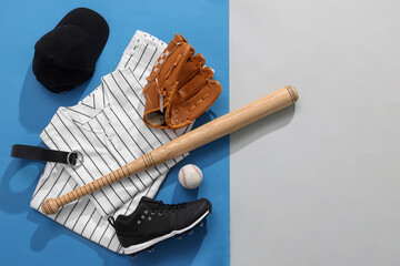 Flat lay composition with baseball uniform and sports equipment on color background. Space for text