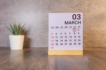 March 1 calendar date text on wooden blocks with blurred park background. Copy space and calendar concept - obrazy, fototapety, plakaty
