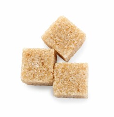 Three brown sugar cubes isolated on white, top view