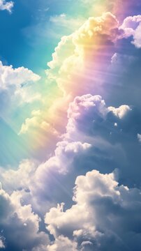 Dreamy cloudscape infused with spectrum of soft rainbow hues. Abstract beautiful sky. Copy Space. Ideal for creative projects, digital wallpapers, or educational materials on weather. Vertical format