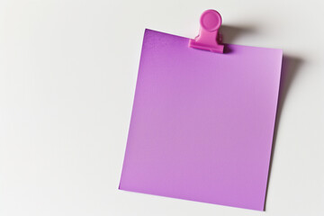 one Purple colored sticky note pinned on a white background, Empty blank note paper stick on white board, pinned Reminder memo isolated on flat wall, Purple color blank sheet paper on white background