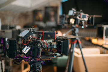 Professional cinema and video camera on the set. Shooting shift, lighting fixtures, shooting...
