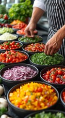 Obraz premium Person in a Kitchen Preparing Food in Bowls