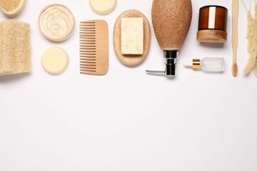 Bath accessories. Different personal care products and dry spikelets on white background, flat lay...
