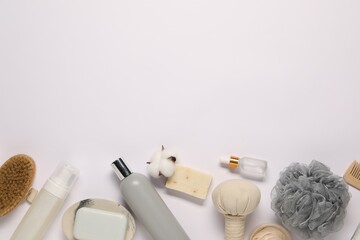 Bath accessories. Flat lay composition with personal care products on white background, space for text