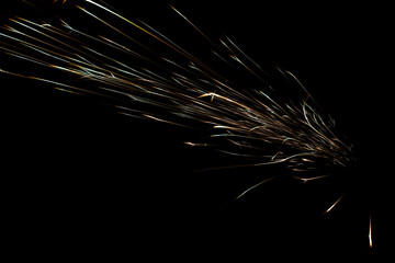 lines of light. sparks in the dark