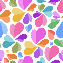 Colorful hearts seamless vector pattern. Attractive ornament with colorful hearts isolated on white backdrop. Creative art texture for printing on various surfaces or usage in graphic design projects.