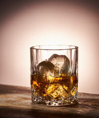 Glass of scotch and ice