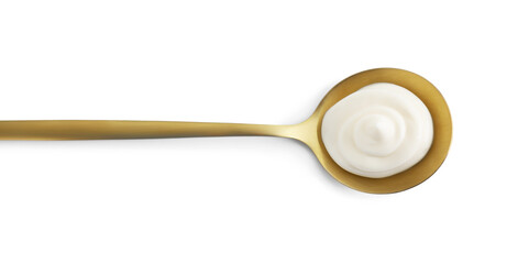 Golden spoon with mayonnaise isolated on white, top view