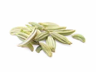 Many dry fennel seeds isolated on white