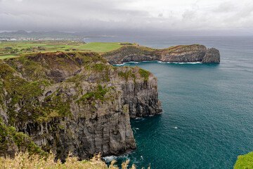 High cliff in the Miradouro do Cintrao along the northern coastline of Sao Miguel island, in the...