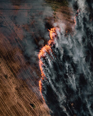 aerial view of burning field with crops in europe