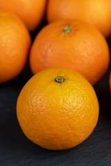 orange tangerines on the table