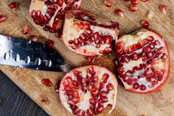 red ripe pomegranate with red grains