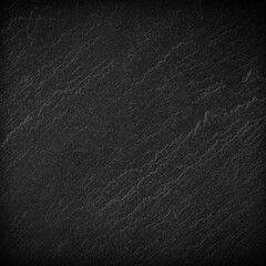 Dark grey black slate background or texture.