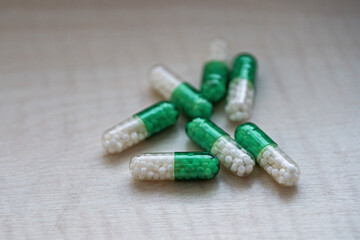 Greenish-white cylindrical powder in detail.