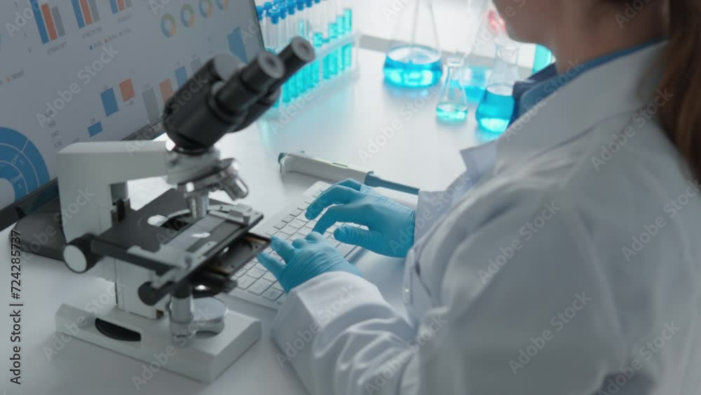 Poster A modern medical laboratory becomes a forge of innovative ideas under the guidance of a research scientist. Her research, carried out under a microscope and analyzed with the help of a computer