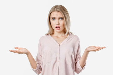 Portrait of angry young woman screaming isolated over white background. Negative emotion of...