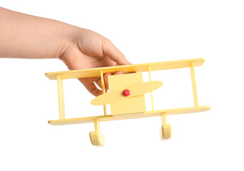 Female hand with toy plane isolated on white background, closeup