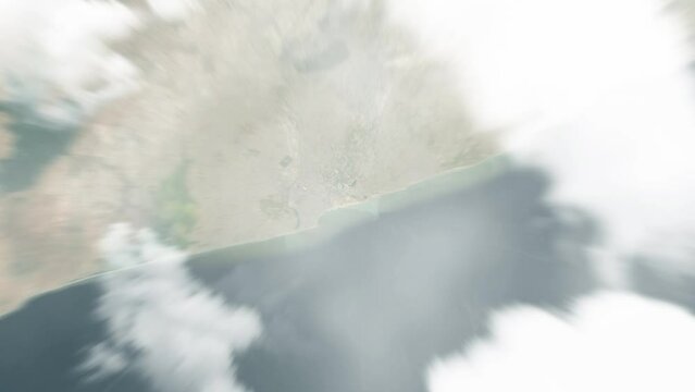 Earth zoom in from space to Accra, Ghana. Followed by zoom out through clouds and atmosphere into space. Satellite view. Travel intro. Images from NASA