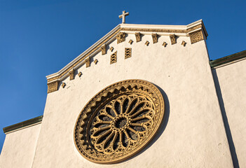 Santa Barbara, CA, USA - January 19, 2024: Closeup of giant sculpted rosas in Southern transept...