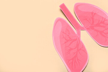Paper lungs on beige background