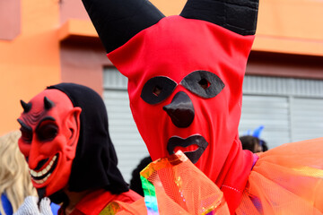 Group of women dressed as devils during the carnival parade
