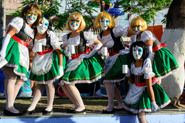Group of women dressed as dolls in the carnival parade