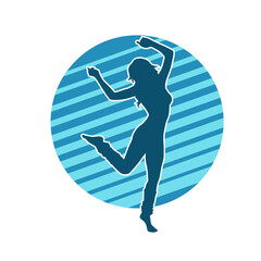 Silhouette of a slim female in dance pose. Silhouette of a woman dancing.