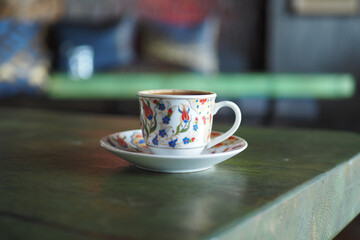 a cup of turkish coffee on table 