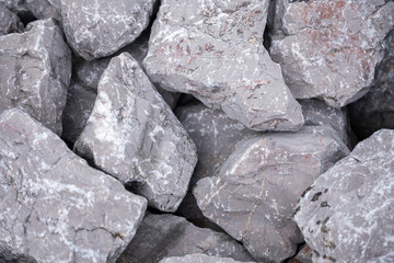 Close-up grey stones textures, top view of large granite rocks