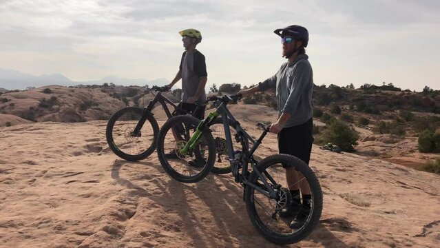 Men, mountain bike and cycling off road for journey performance, fitness or extreme sport. Male people, friends and cardio transport on dirt terrain or outdoor athlete for wellness, exercise or skill