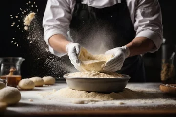 Foto op Plexiglas male hands making dough for pizza with flour scattering © paisan1leo