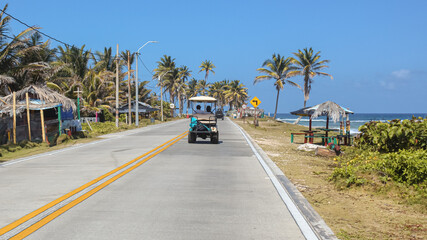 driving a Golf Cart around this magic island on San Andres Island, Colombia,