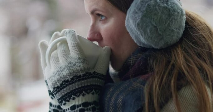 Woman Enjoying a Hot Drink in Winter