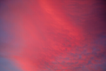 pink clouds in the sky during sunset