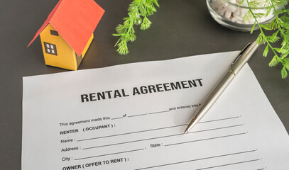 A rental agreement form on the desk