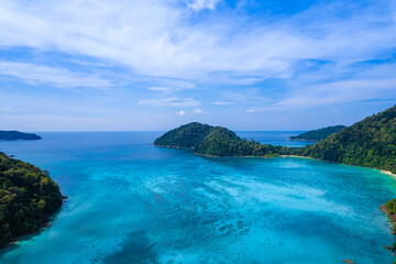Aerial view of  Island in the Andaman Sea. natural blue sea Tropical seas of Thailand The beautiful scenery of the island is very impressive.