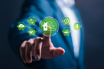 Energy efficiency concept. Businessman touching virtual screen of energy efficiency rating for energy efficient house building rate label audit.