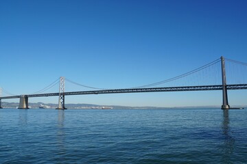 Fototapeta na wymiar Oakland Bay Bridge over the sea - San Francisco, America