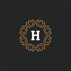 Initial letter H ornamental border circle frame logo