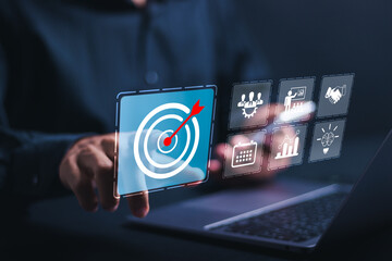 Targeting business concept. Person use laptop with virtual target icon for business objective....