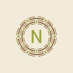Initial letter N ornamental border circle frame logo