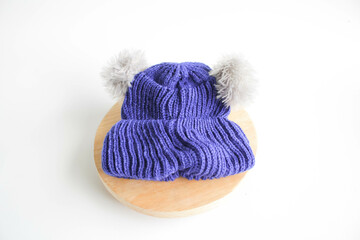 blue wool hat for baby on white background