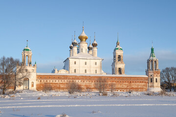 Fototapeta na wymiar At the ancient Spaso-Yakovlevsky Dmitriev Monastery on a sunny January day. Rostov, Golden Ring of Russia