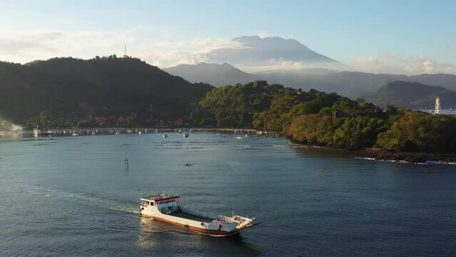 Padang Bai, Bali: Aerial drone footage of the stuning coastline of Bali with the Agung volcano near Padang Bai in Bali, Indonesia