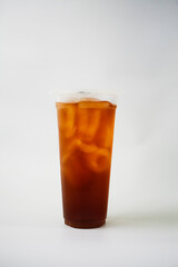 Take away iced tea in plastic cup isolated on white background