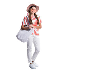 teen girl in summer tote at studio with copy space advertisement. teen girl in summer tote